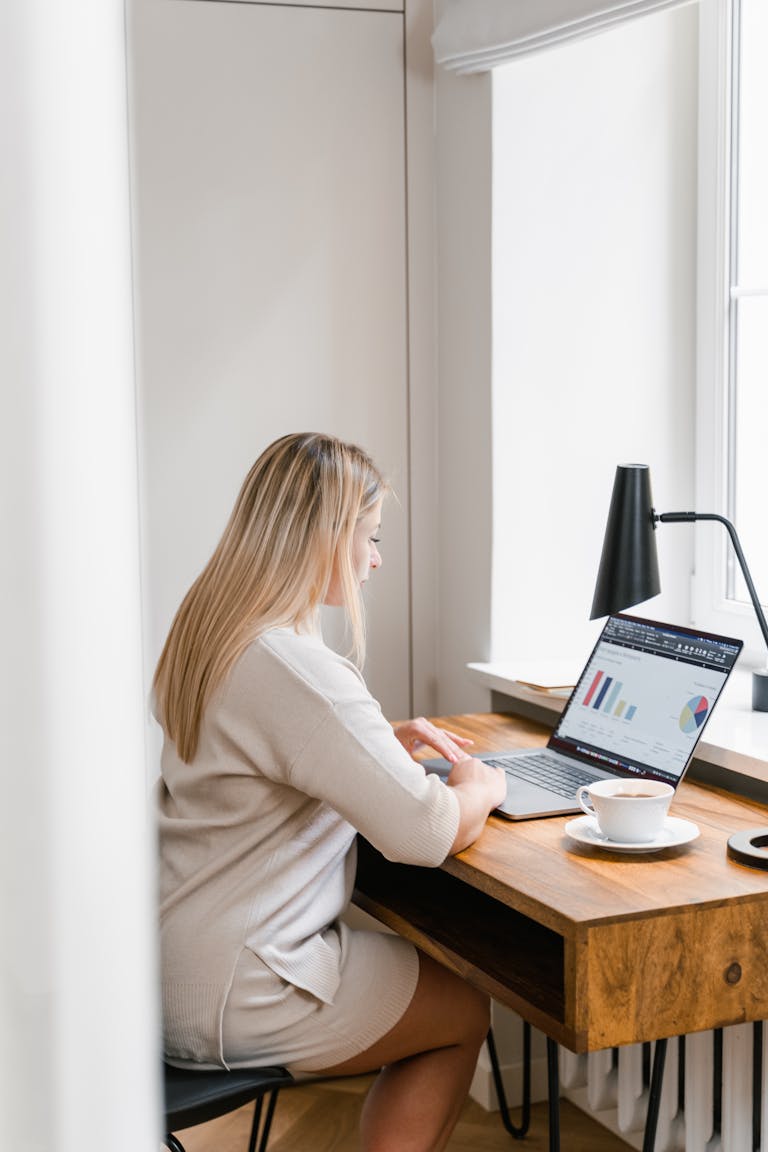 Woman reviewing financial documents while making divorce planning decisions