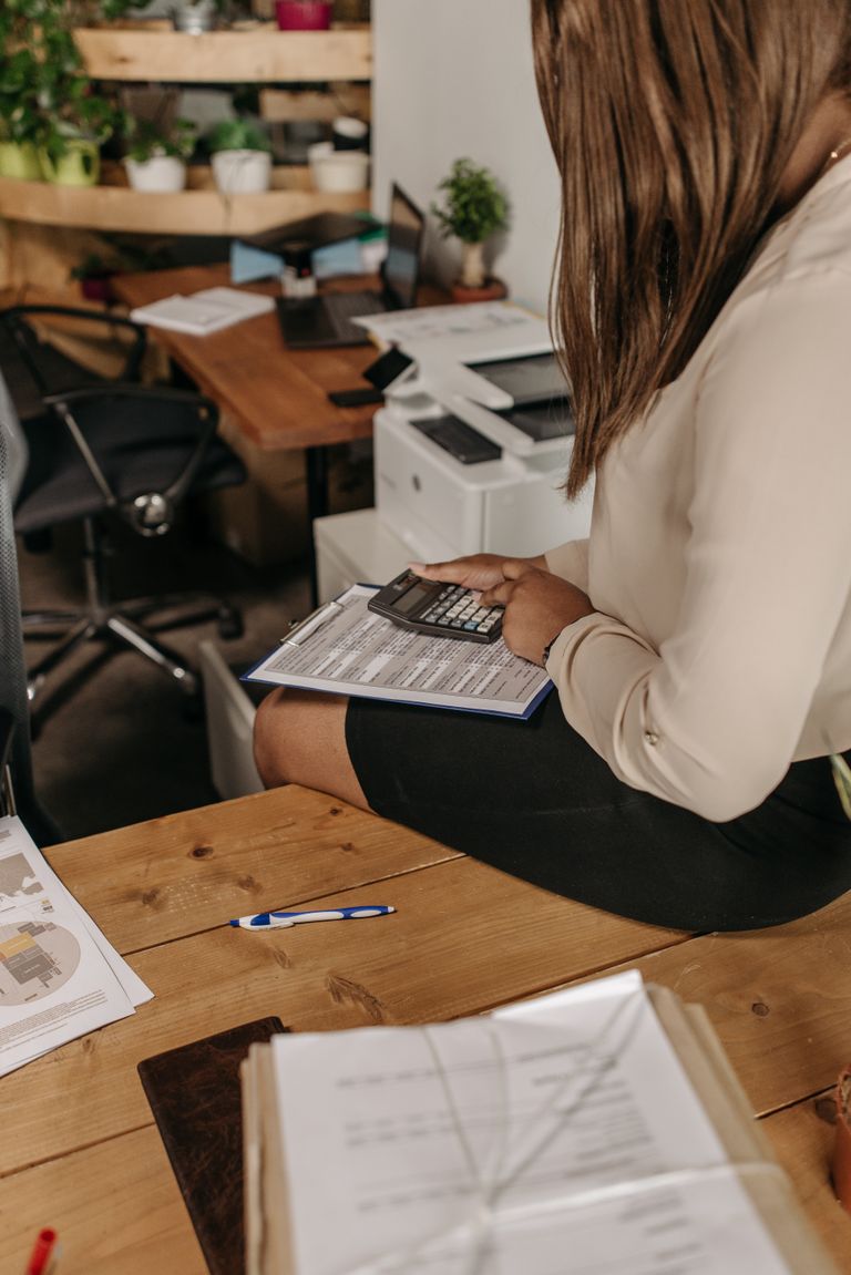 Professional reviewing equity compensation and tax planning documents